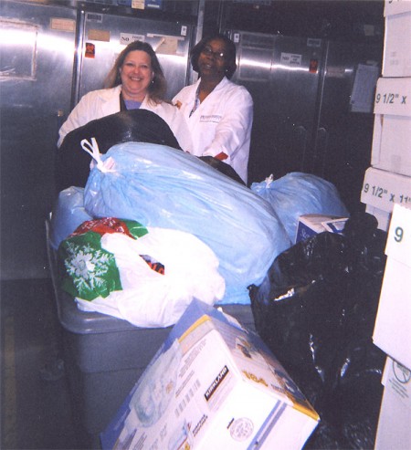 Lisa and Wanda preparing donations for delivery to BEA GADDY